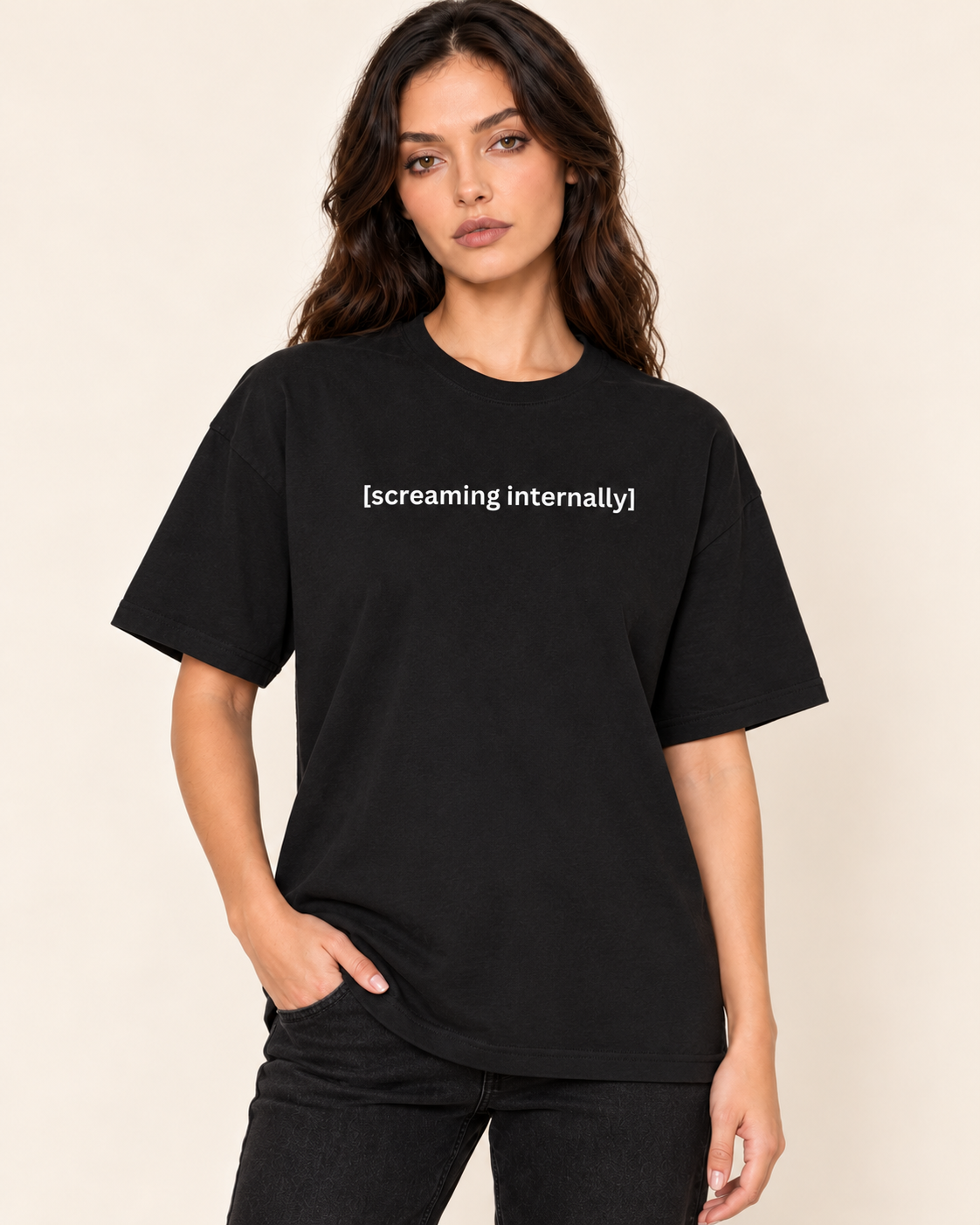 [Closed Captions] Screaming Internally - Unisex Oversized Boxy Tee — Black on Treattees studio model, matching actual CustomCat print placement