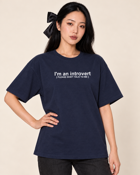 Introvert; Please Don’t Talk To Me - Oversized Tee — Navy on Treattees studio model, matching actual CustomCat print placement