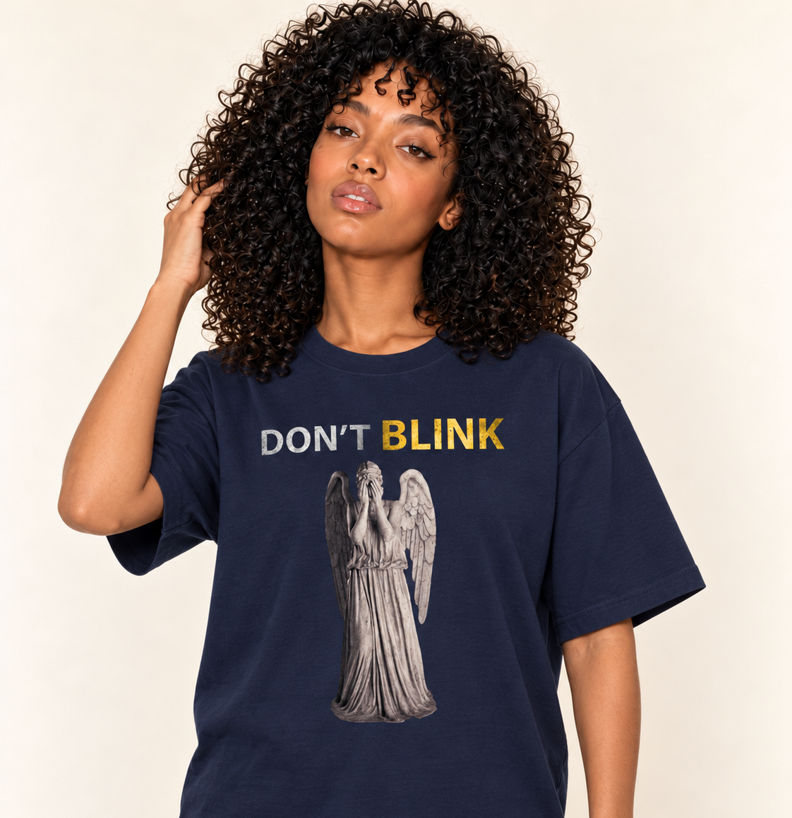 Don't Blink - Oversized Tee — Navy, existing Treattees model, direct crop, original print unchanged