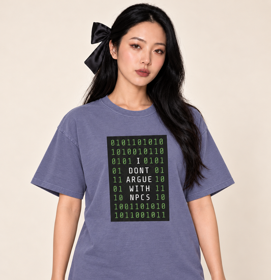 I Don't Argue With NPCS – Relaxed Heavyweight Tee — Grape Juice, existing Treattees model, direct crop, original print unchanged