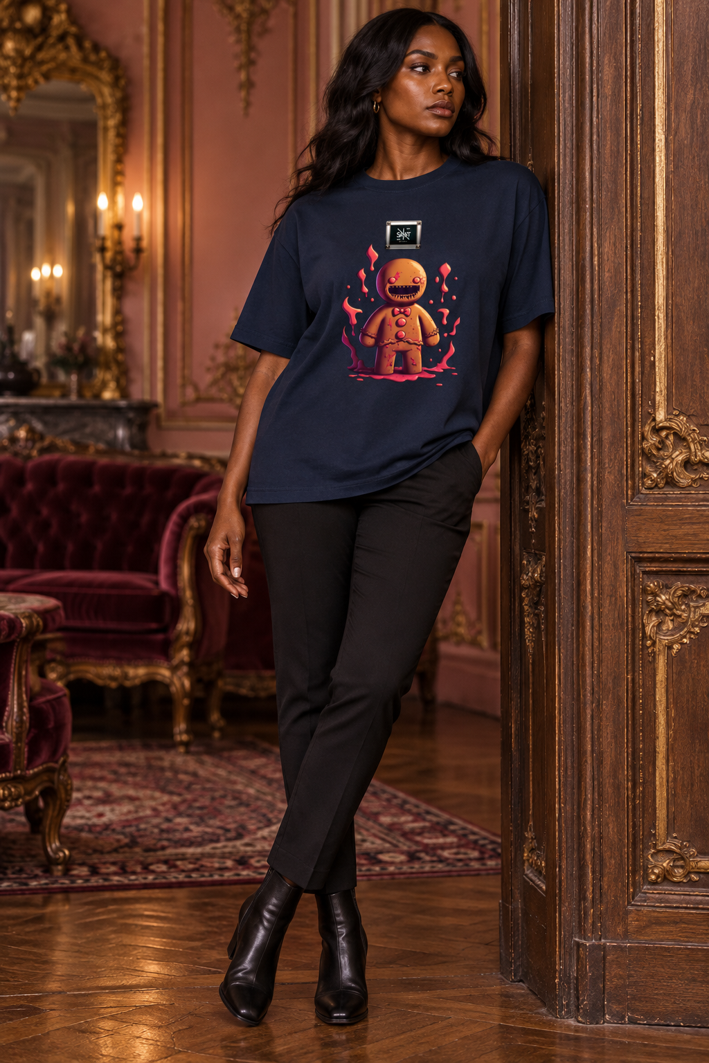 Hell’Raisin Ginger oversized navy tee on model in gilded salon